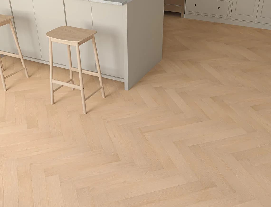 Oakleigh Deluxe 12mm Herringbone Kingham Laminate in a room