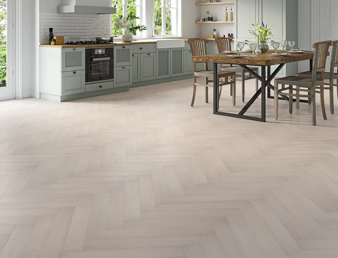 Oakleigh Deluxe 12mm Herringbone Malham Laminate laid in a room