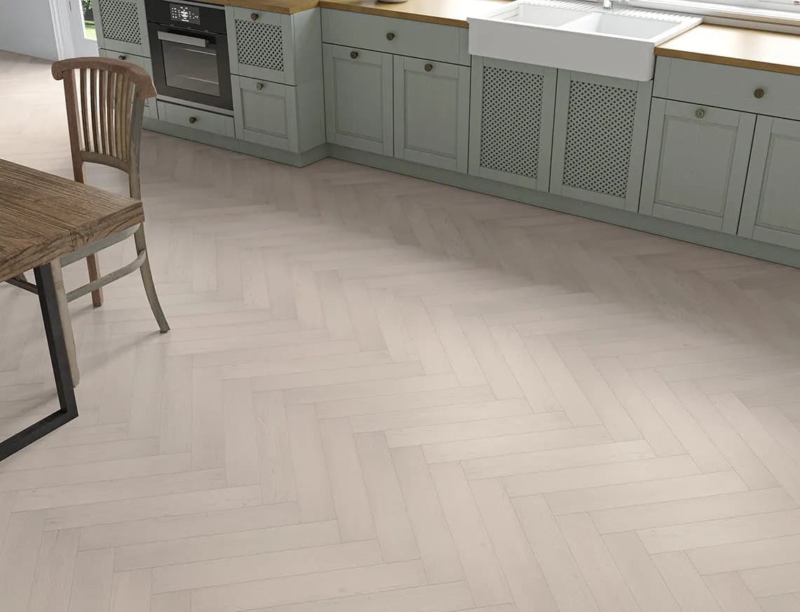 Oakleigh Deluxe 12mm Herringbone Malham Laminate in a room