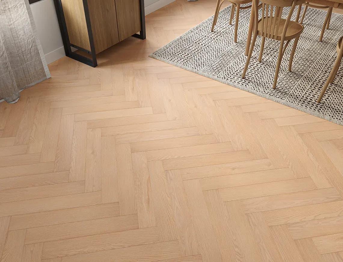 Oakleigh Deluxe 12mm Herringbone Ripley Laminate in a room