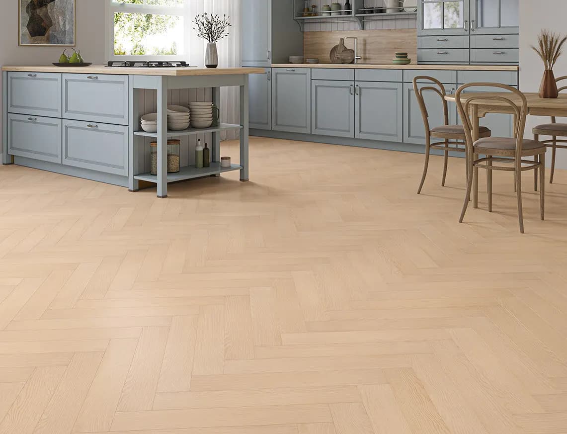 Oakleigh 8mm Herringbone Kingham Laminate laid in a room