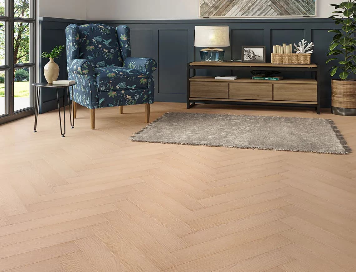Oakleigh 8mm Herringbone Ripley Laminate laid in a room