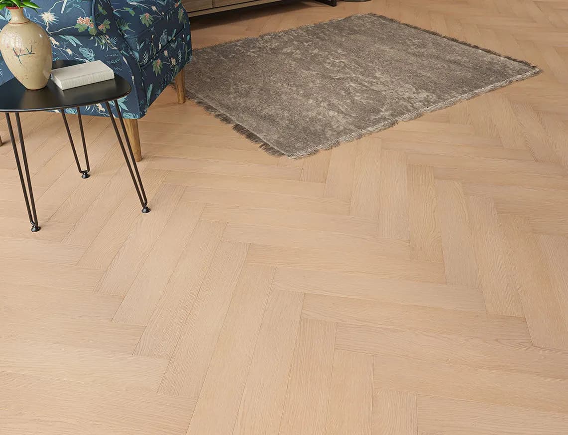 Oakleigh 8mm Herringbone Ripley Laminate in a room