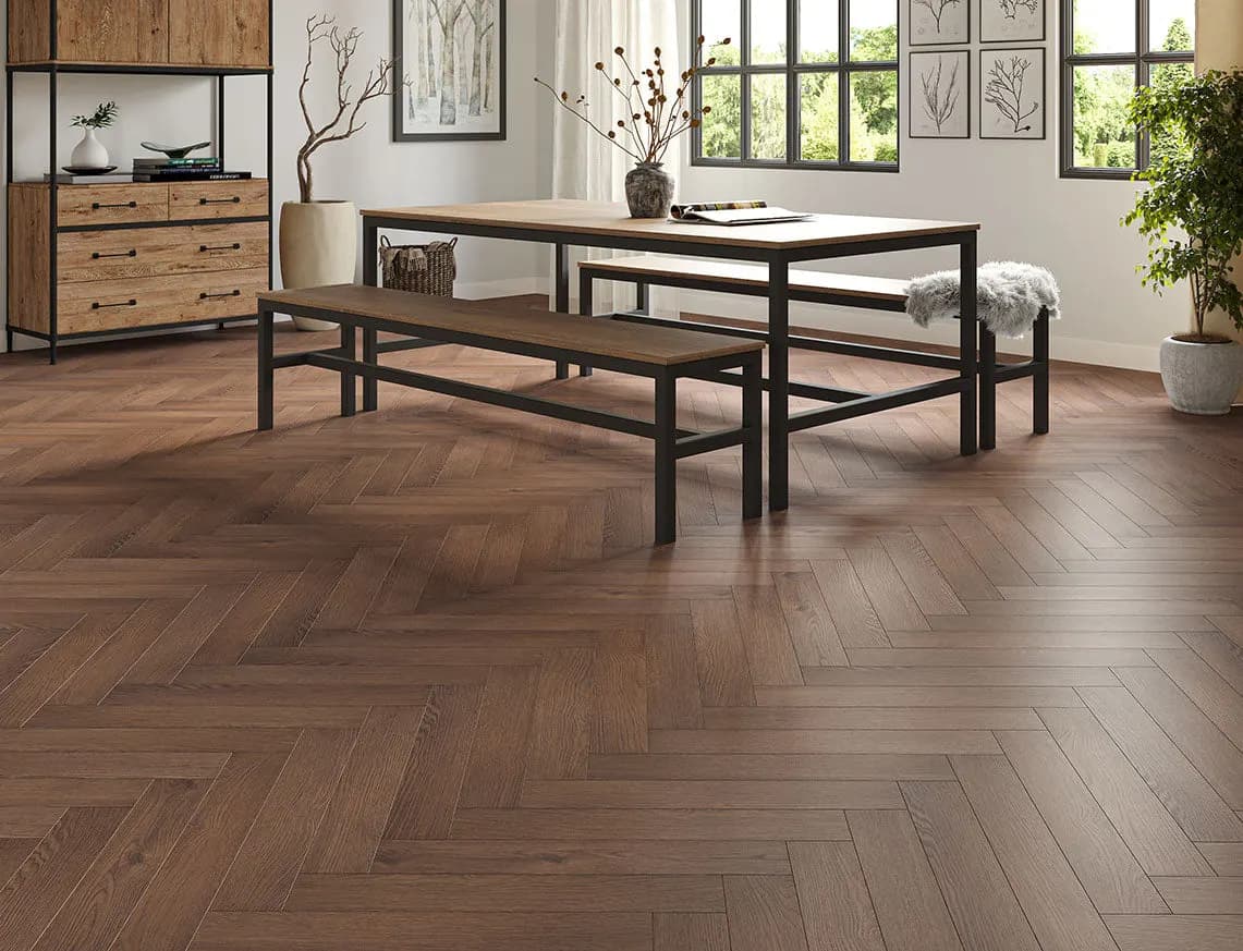 Oakleigh 8mm Herringbone Romsey Laminate laid in a room